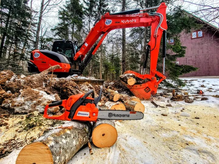 Tree Removal With Backhoe And Chainsaw